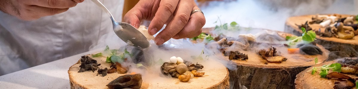 Chef Preparing Vegetable Dish On Tree Slab 1267320